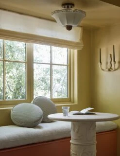 Isla Disc Pillow By Sarah Sherman Samuel 14 Isla Disc Pillow By Sarah Sherman Samuel -Home Decor Sale Lulu and Georgia 18 BistrotableBathroom 2969 RoundPillows DoubleSconce Site Crop Lifestyle 710b590c 88b3 4c4b 822b f035054f95c2