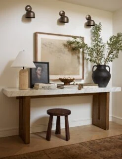 Portrait Of A Man Wall Art By Ryan Brown -Home Decor Sale Lulu and Georgia 20 EntryConsole 1817 Site crop Lifestyle 49010d59 e71c 45aa ac24 84c0684429ab