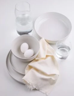 Essential Dinnerware 16-Piece Set By Hawkins New York -Home Decor Sale Lulu and Georgia essential dinnerware 16 piece set HNY.500.20.MIX lifestyle2 Product 7d36e3b6 735f 4217 a532 f47ccb7b6104