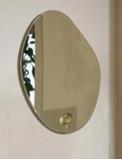 Pond Mirror By Ferm Living -Home Decor Sale Lulu and Georgia fermLIVING AW21 PondMirrorXLDarkChrome TinyFloorLampBrass image lifestyle